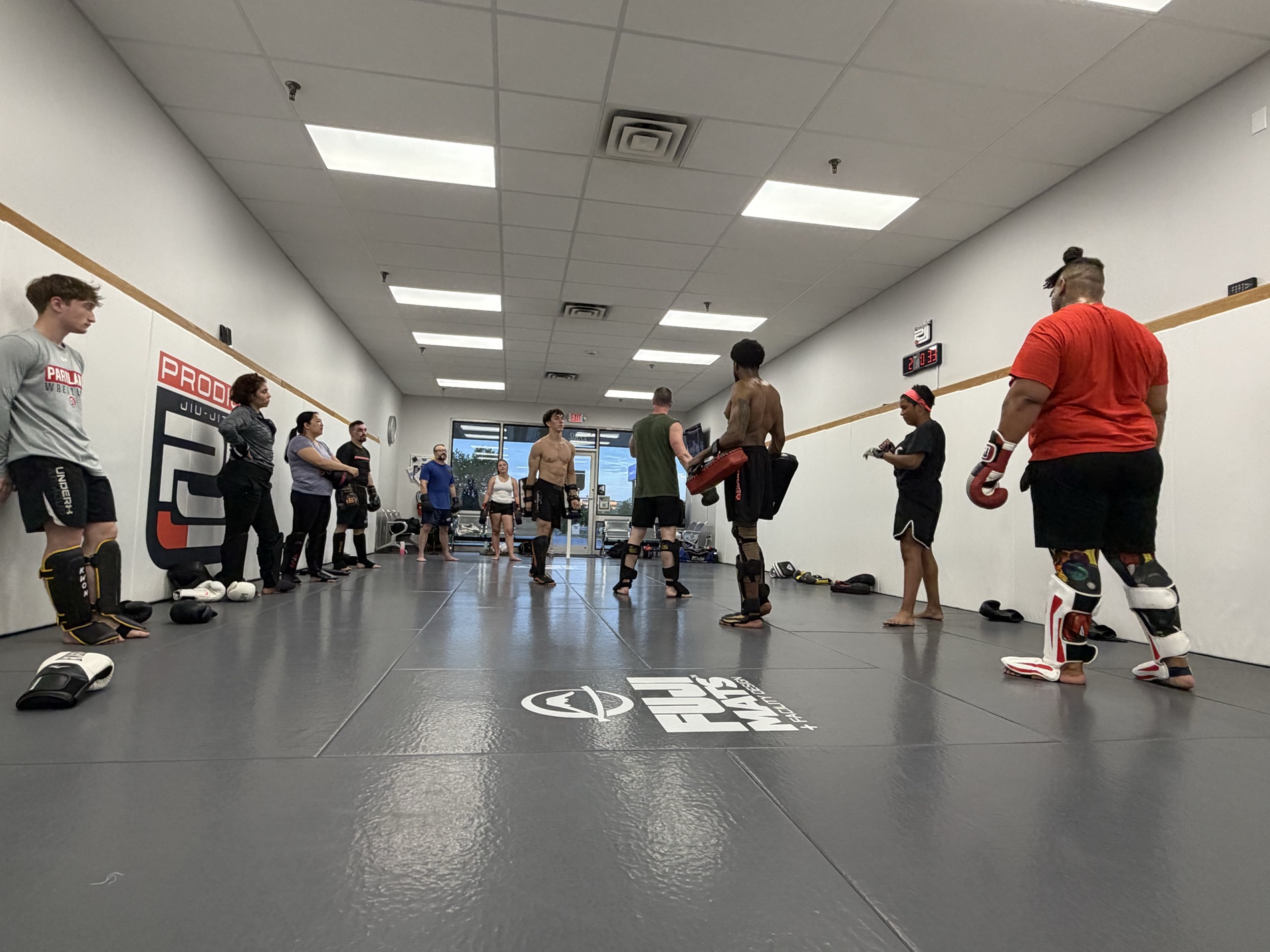 A Muay Thai striking class doing pad work at Prodigy Jiu-Jitsu in Fogelsville, PA